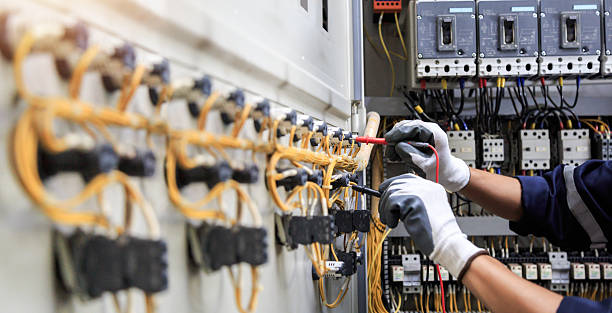 Professional Electrical Panel Upgrade technician working in Warren County County, IA